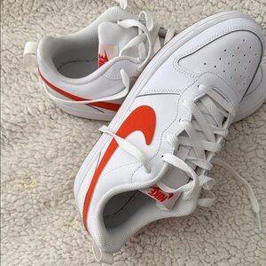 Nike Kids White Sneakers with Orange Swoosh